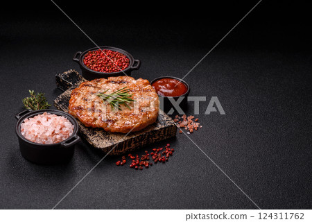 Delicious fresh grilled turkey fillet with spices and herbs 124311762