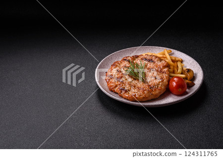 Delicious fresh grilled turkey fillet with spices and herbs 124311765