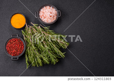Fresh green rosemary sprigs prepared for cooking Fresh green rosemary sprigs prepared for cooking 124311803