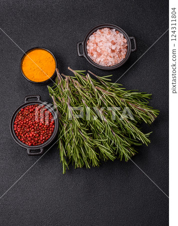 Fresh green rosemary sprigs prepared for cooking 124311804