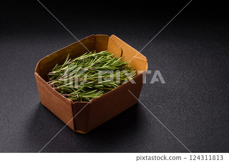 Fresh green rosemary sprigs prepared for cooking 124311813