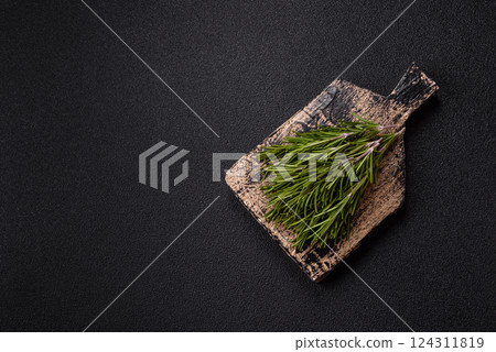 Fresh green rosemary sprigs prepared for cooking 124311819