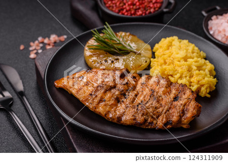 Delicious fresh grilled chicken fillet with spices and herbs 124311909