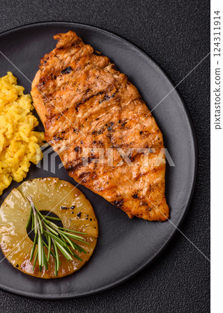Delicious fresh grilled chicken fillet with spices and herbs 124311914