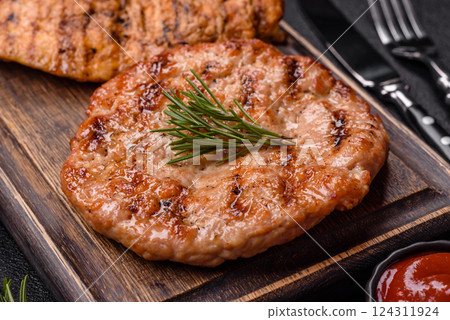 Delicious fresh grilled turkey fillet with spices and herbs 124311924
