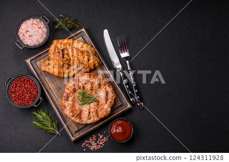 Delicious fresh grilled turkey fillet with spices and herbs 124311928