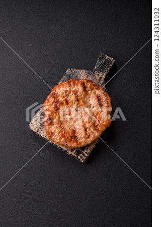 Delicious fresh grilled turkey fillet with spices and herbs 124311932