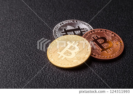 Bitcoin cryptocurrency dummy in the form of a round iron coin Bitcoin cryptocurrency dummy in the form of a round iron coin 124311993