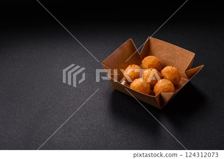 Crispy French fries with mozzarella cheese with raspberry sauce 124312073