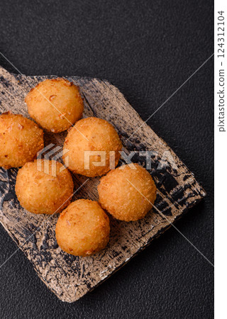 Crispy French fries with mozzarella cheese with raspberry sauce 124312104