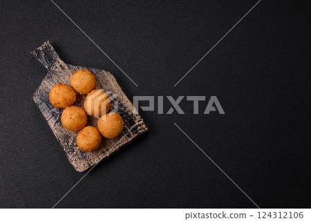 Crispy French fries with mozzarella cheese with raspberry sauce Crispy French fries with mozzarella cheese with raspberry sauce 124312106