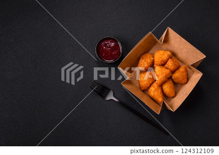 Brie cheese or camembert fries in breading, fast food, takeaway 124312109