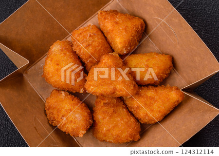 Brie cheese or camembert fries in breading, fast food, takeaway 124312114