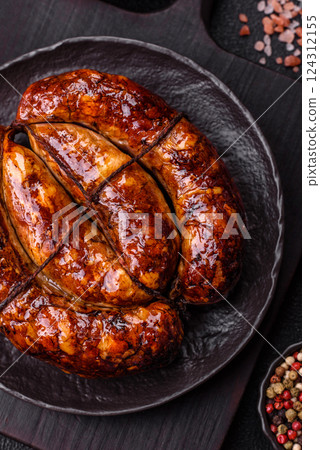 Delicious sausage with salt, spices and herbs Delicious sausage with salt, spices and herbs 124312155