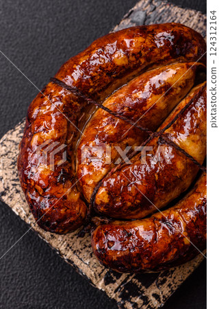Delicious sausage with salt, spices and herbs 124312164