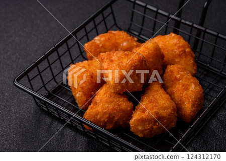 Brie cheese or camembert fries in breading, fast food, takeaway 124312170