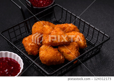 Brie cheese or camembert fries in breading, fast food, takeaway Brie cheese or camembert fries in breading, fast food, takeaway 124312173