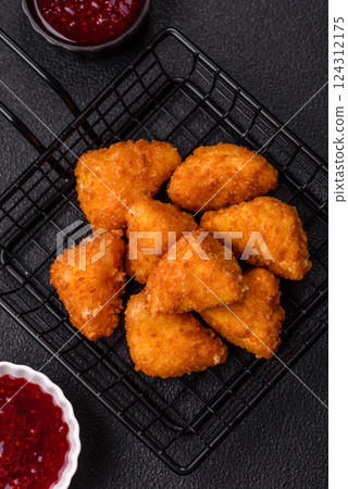 Brie cheese or camembert fries in breading, fast food, takeaway Brie cheese or camembert fries in breading, fast food, takeaway 124312175