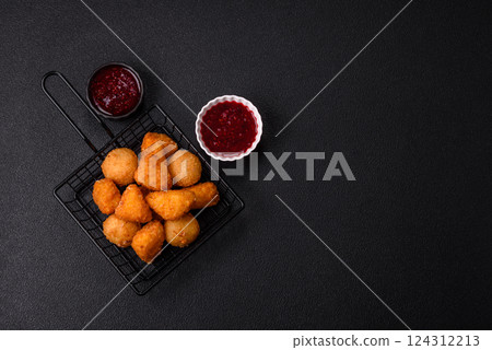 Brie cheese or camembert fries in breading, fast food, takeaway Brie cheese or camembert fries in breading, fast food, takeaway 124312213