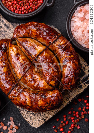Delicious sausage with salt, spices and herbs 124312302
