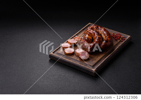 Delicious sausage with salt, spices and herbs 124312306