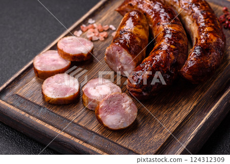 Delicious sausage with salt, spices and herbs 124312309