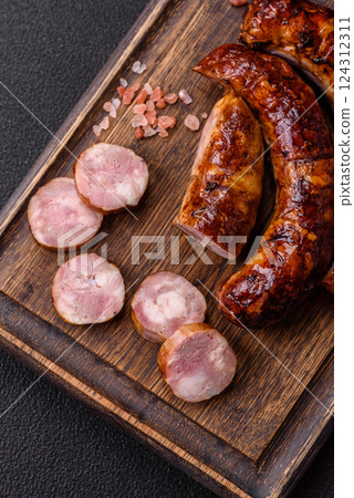 Delicious sausage with salt, spices and herbs 124312311