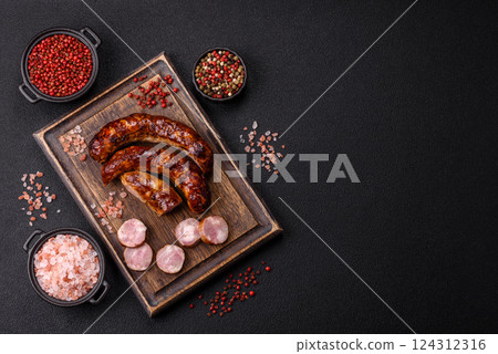 Delicious sausage with salt, spices and herbs Delicious sausage with salt, spices and herbs 124312316