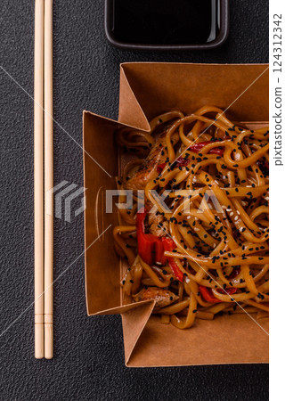 Delicious Asian food udon with noodles, chicken, hot pepper, vegetables Delicious Asian food udon with noodles, chicken, hot pepper, vegetables 124312342