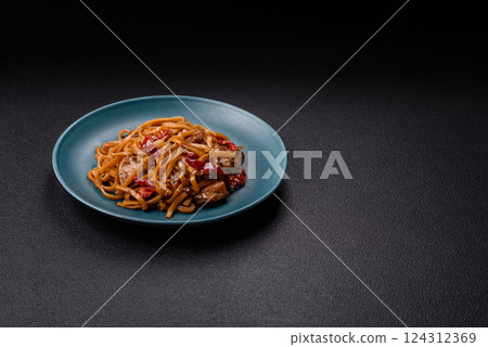 Delicious Asian food udon with noodles, chicken, hot pepper, vegetables 124312369