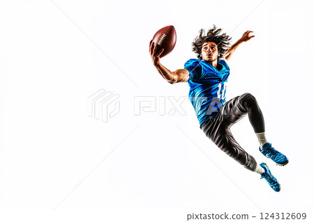 athlete leaps into air to catch ball during an intense American football practice, frozen moment of dynamic action demonstrates passion of competitive sports, white neutral background with copy space athlete leaps into air to catch ball during an intense American football practice, frozen moment of dynamic action demonstrates passion of competitive sports, white neutral background with copy space 124312609
