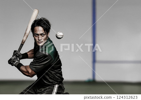 Baseball hitter preparing to bat, tense moment in amateur baseball, intense gaze conveys the focus and strategy of playing the game of millions 124312623