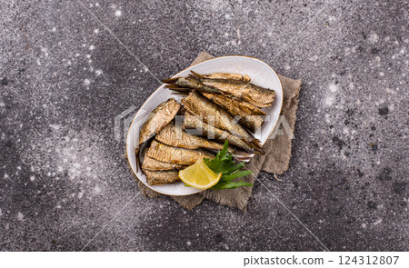 Canned smoked sprats in oil Canned smoked sprats in oil 124312807