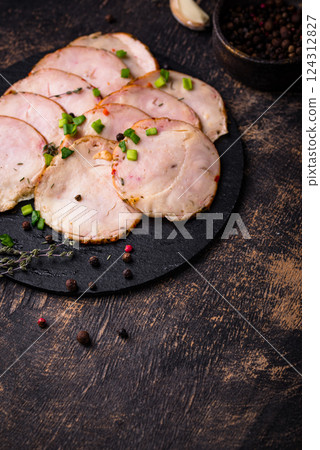 Sliced chicken sausage with herbs Sliced chicken sausage with herbs 124312827