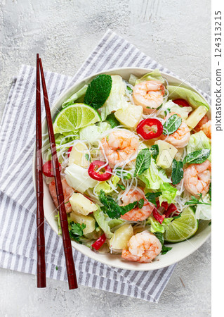 Thai salad with shrimp and rice noodles, pineapple slices, coriander and mint leaves, homemade , no people, 124313215