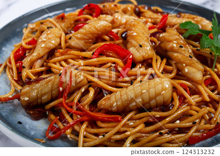 udon noodles, with squid and vegetables, on a marble table, homemade, no people, 124313232