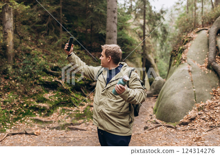 No communication coverage, lost contact signal device. Sad blonde man got lost and could not find an internet connection on phone while hiking alone in the wild forest. Adventure and tourism concept No communication coverage, lost contact signal device. Sad blonde man got lost and could not find an internet connection on phone while hiking alone in the wild forest. Adventure and tourism concept 124314276