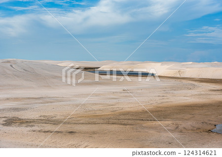 Dunes and lagoons of lagoa bonita, Lencois Maranhenses, Barreirinhas, Brazil. White sand dunes with pools of fresh water 124314621