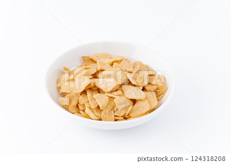 Garlic chips in a plate 124318208