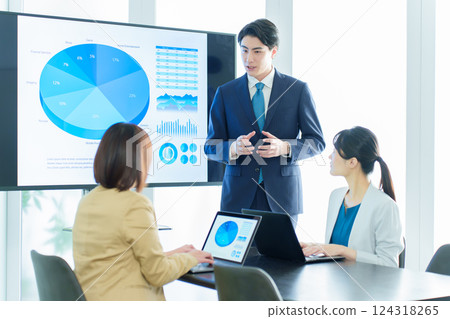Business people having a meeting in a conference room Business people having a meeting in a conference room 124318265