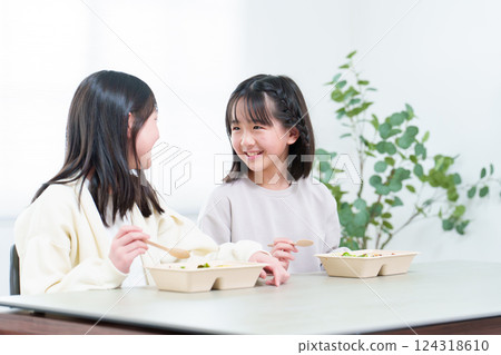 A girl who eats rice A girl who eats rice 124318610