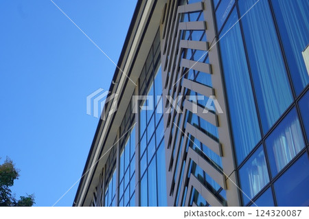 The exterior of a concert hall in the city. 124320087