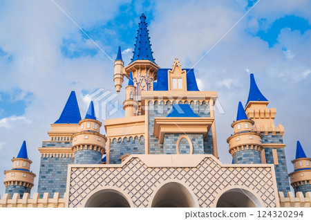 roof of a beautiful fantastic fairy tale castle in the Magic City amusement park in Tashkent in Uzbekistan on the background of the blue sky roof of a beautiful fantastic fairy tale castle in the Magic City amusement park in Tashkent in Uzbekistan on the background of the blue sky 124320294