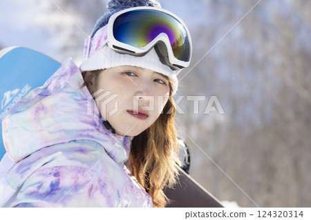 Cute woman in ski wear Cute woman in ski wear 124320314