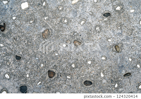 texture of gray asphalt with stone. Sidewalk background texture of gray asphalt with stone. Sidewalk background 124320414