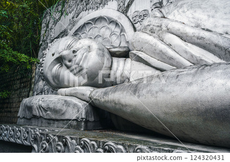 Large reclining Buddha statue at Long Son Pagoda in Nha Trang in Vietnam Large reclining Buddha statue at Long Son Pagoda in Nha Trang in Vietnam 124320431