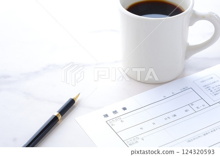 Creating a resume for job hunting while drinking coffee 124320593