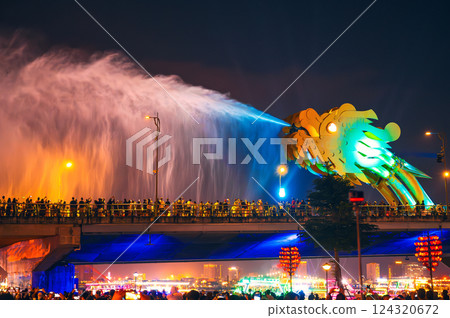 Fire water show on Dragon Bridge or Cau Rong Bridge in Da Nang in Vietnam at night Fire water show on Dragon Bridge or Cau Rong Bridge in Da Nang in Vietnam at night 124320672