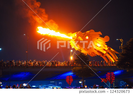 Fire show on Cau rong Dragon Bridge in Da Nang in Vietnam in Asia at night 124320673