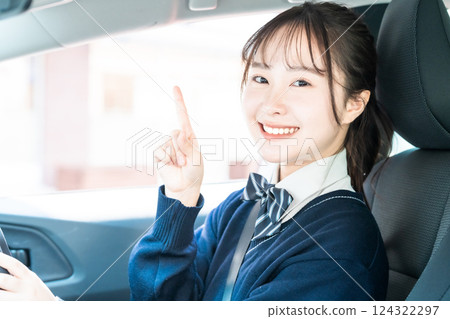 High school students getting a regular driver's license at a driving school High school students getting a regular driver's license at a driving school 124322297